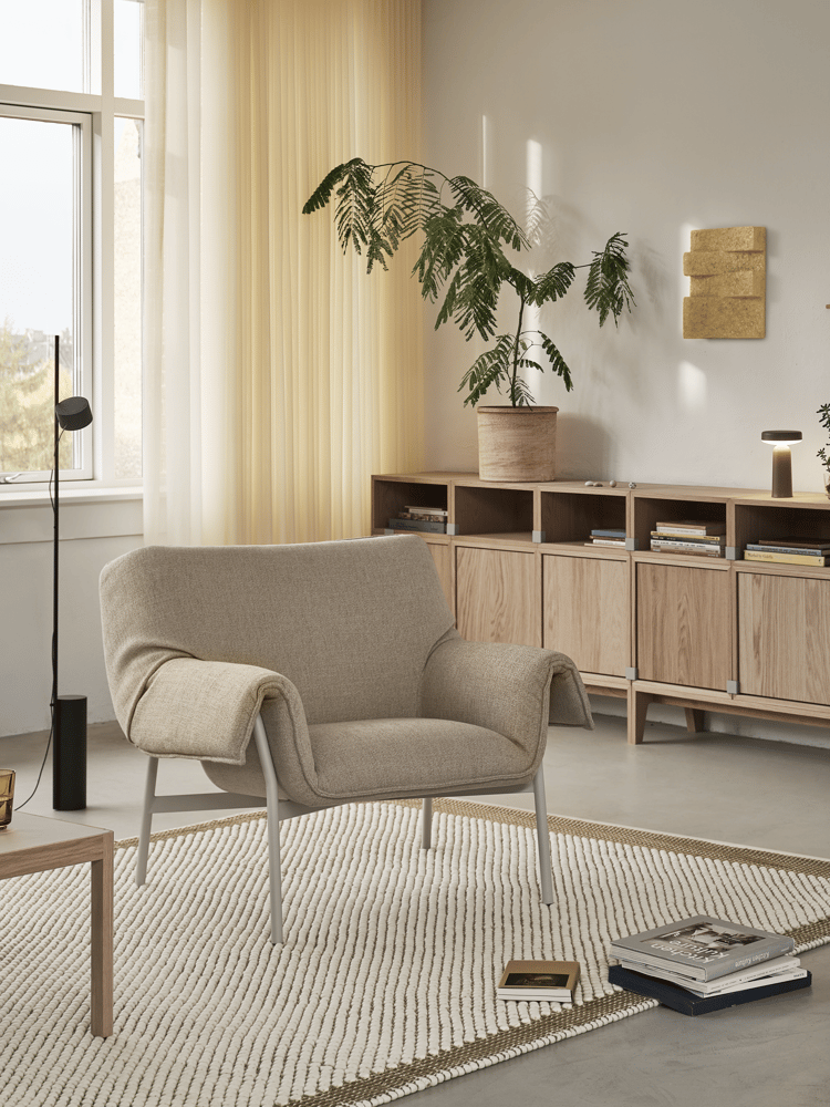 wrap-lounge-chair-ecriture-240-grey-workshop-coffee-table-warm-grey-linoleum-pebble-rug-200x300-brown-green-post-raise-stacked-ease-taupe-muuto-org-34-roll-up-image