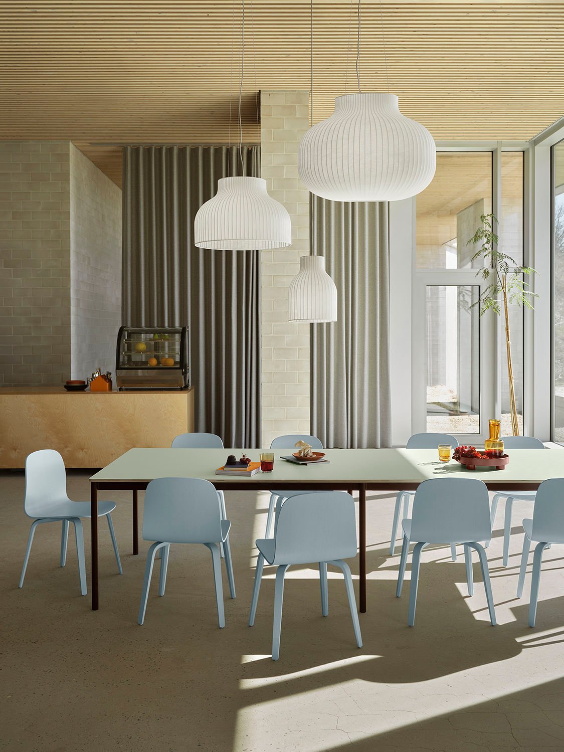/cdn-cgi/image/width=1500,quality=85,format=auto/globalassets/content-media/images/designer/mika-tolvanen/base-table-300-110-light-green-brown-red-visu-chair-light-blue-strand-low-res.jpg