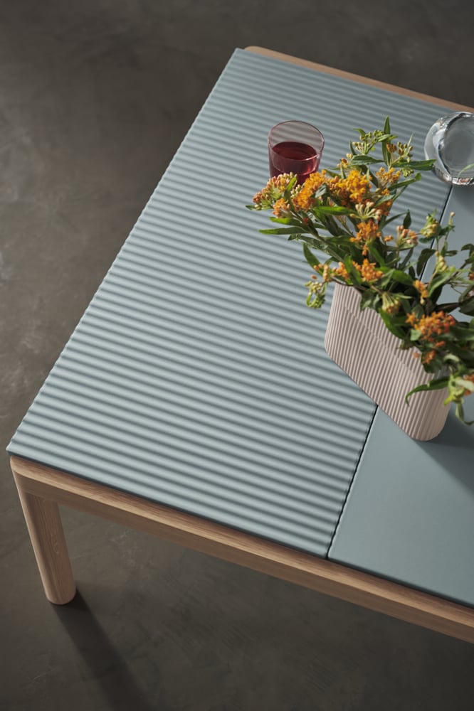 /cdn-cgi/image/width=1500,quality=85,format=auto/globalassets/content-media/images/pdp/coil/couple-coffee-table-80x84x40-plain-wavy-pale-blue-oak-ridge-h16-5-beige-raise-clear-muuto-org-23-roll-up-image.png