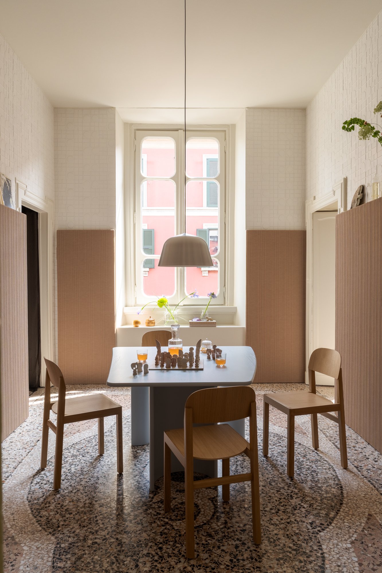 /cdn-cgi/image/width=1500,quality=85,format=auto/globalassets/content-media/images/stories/milan-apartment-2026/muuto-milan-apartment-2026-re-norm-table-workshop-chair-02.jpg
