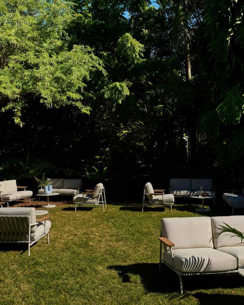 /cdn-cgi/image/width=1500,quality=85,format=auto/globalassets/content-media/images/stories/muuto-at-art-basel-miami-beach/slider/settle-sofa-2-seater-grey-linear-steel-coffee-table-low-res_optimized.jpg