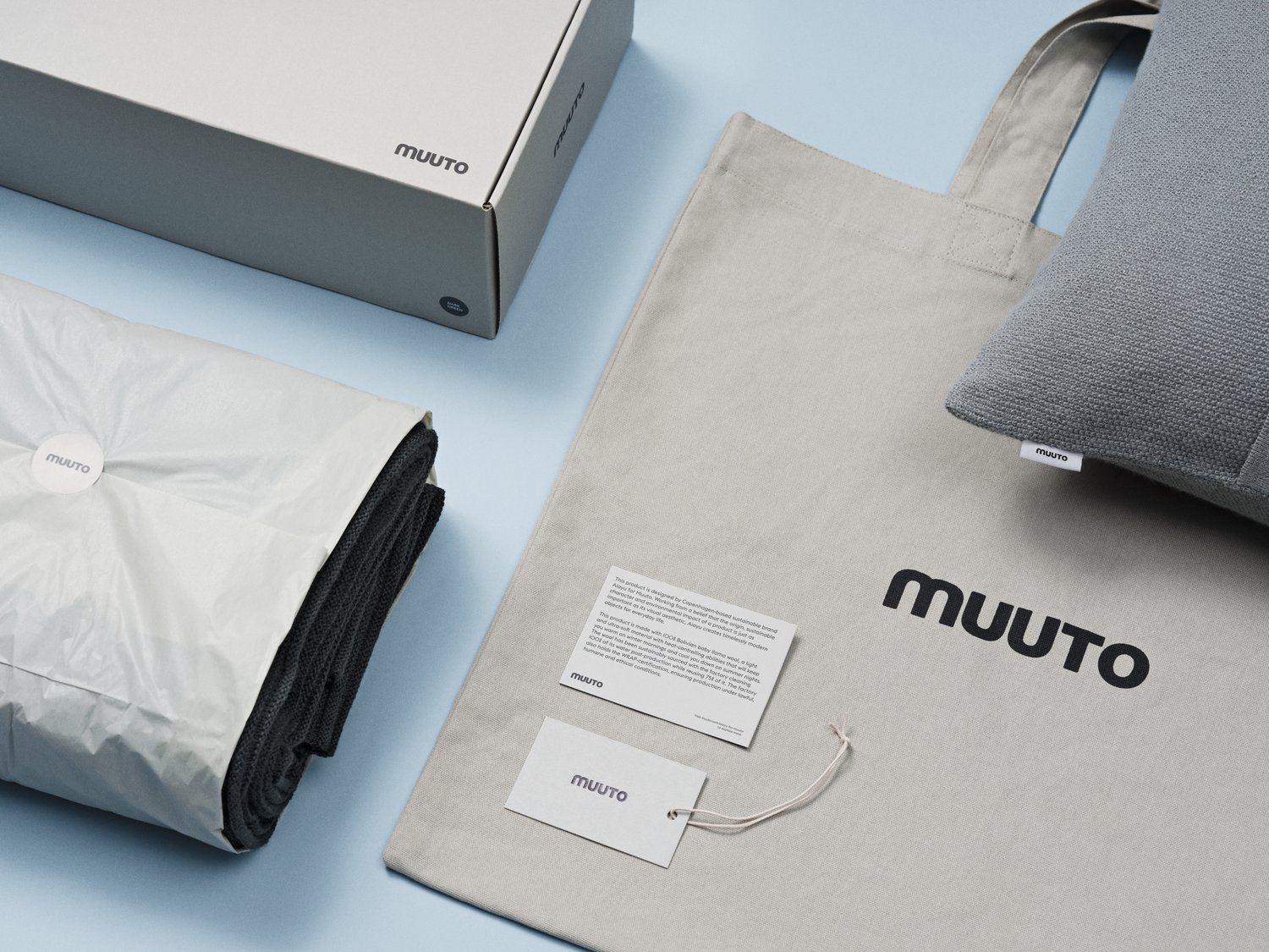 /cdn-cgi/image/width=1500,quality=85,format=auto/globalassets/content-media/images/sustainability/rhythm-throw-layer-cushion-packaging-muuto.png