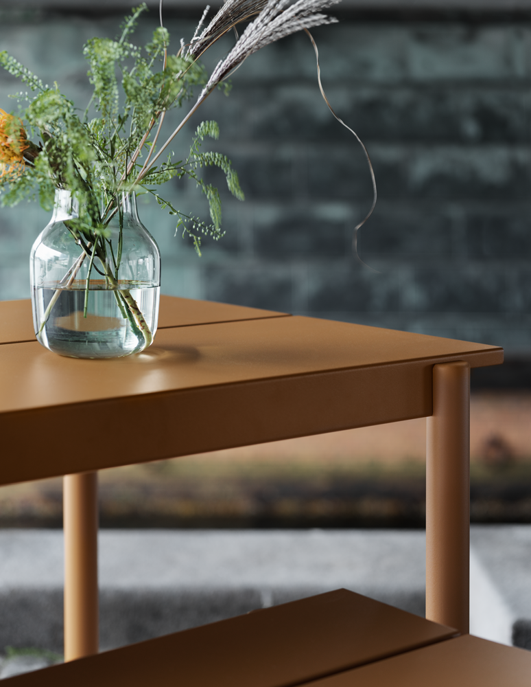 /globalassets/content-media/images/plp/outdoor/tables/linear-steel-table-bench-burnt-orange-silent-detail-muuto-org.png?revision=639076112560000000