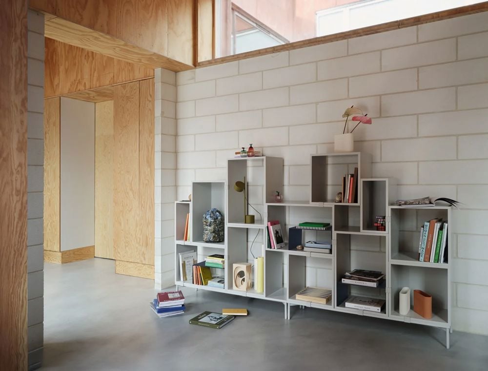 stacked-bookcase-3-grey-post-table-brown-green-ridge-vase-muuto-org