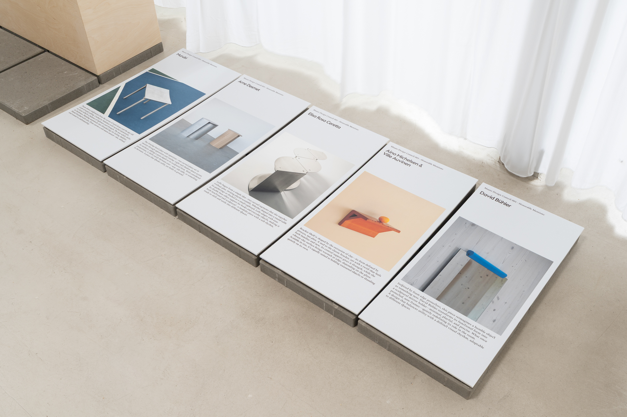  Muuto’s Design Contest 001 are displayed in a thoughtfully styled setting, inviting visitors to explore and learn more about their design stories.