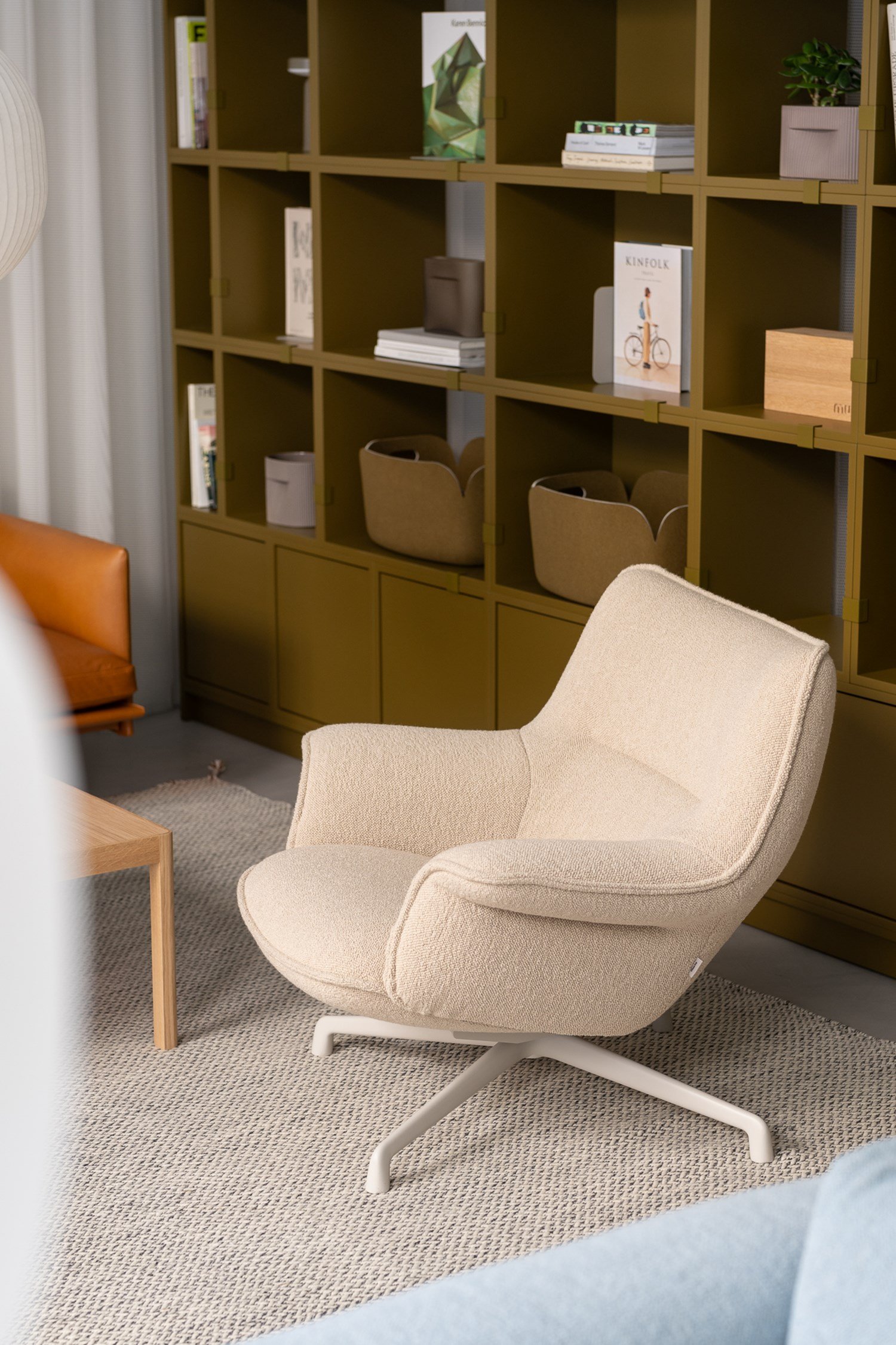 A close up of a Lounge chair in a light sand color. A close up of a Lounge chair in a light sand color.