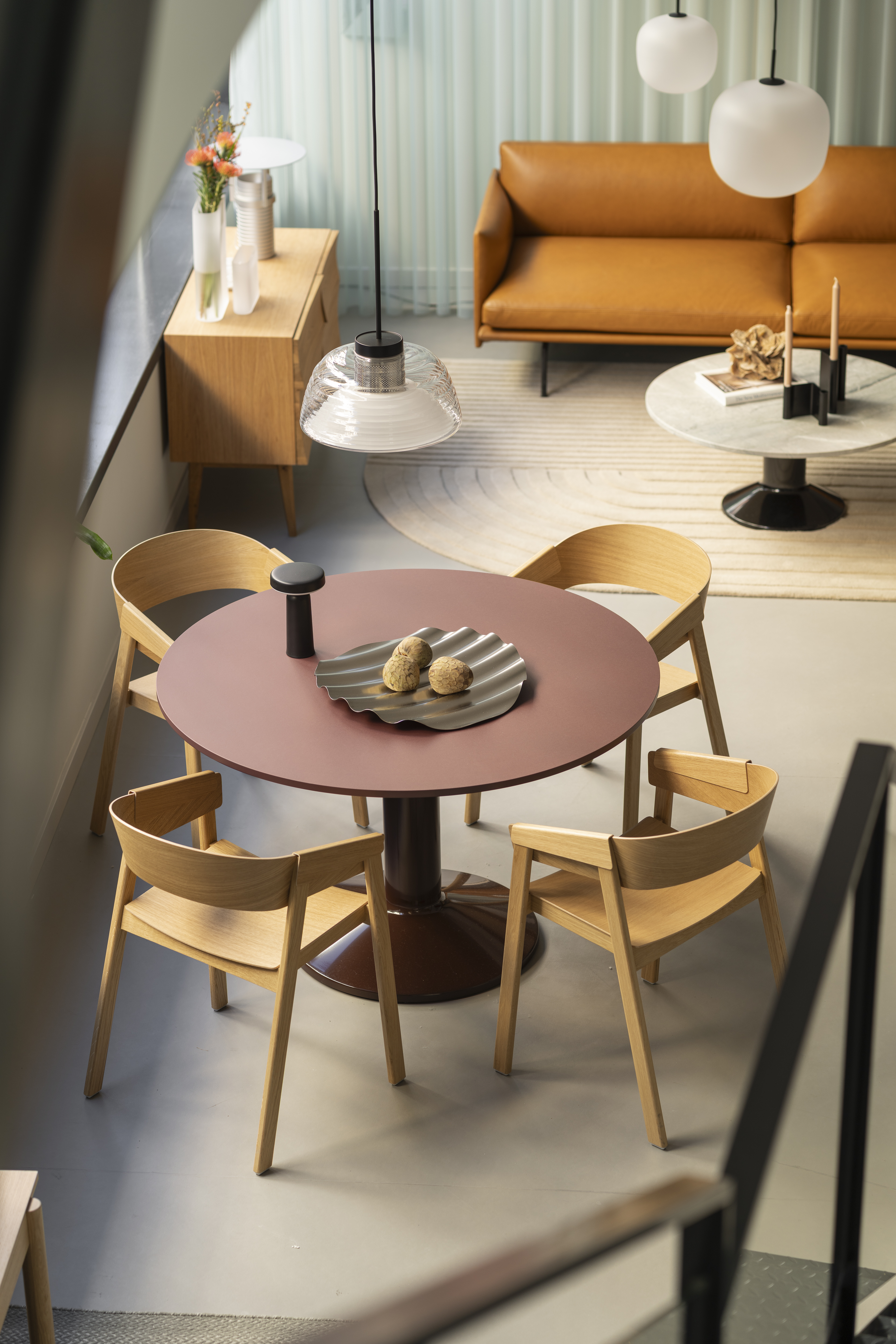 Muuto showroom in Madrid featuring a curated selection of furniture and lighting, styled in a clean and contemporary space with soft tones and modern details.