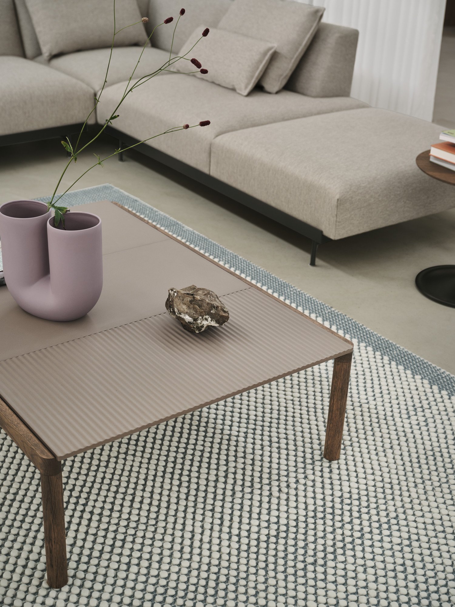Couple Coffee Table 120x84x35 2 Plain 1 Wavy in Taupe/Dark Oiled Oak, Pebble Rug in Pale Blue, Kink Vase in Dusty Lilac, In Situ Modular Sofa in Clay 12, Soft Side Table in Black/Smoked Oak
